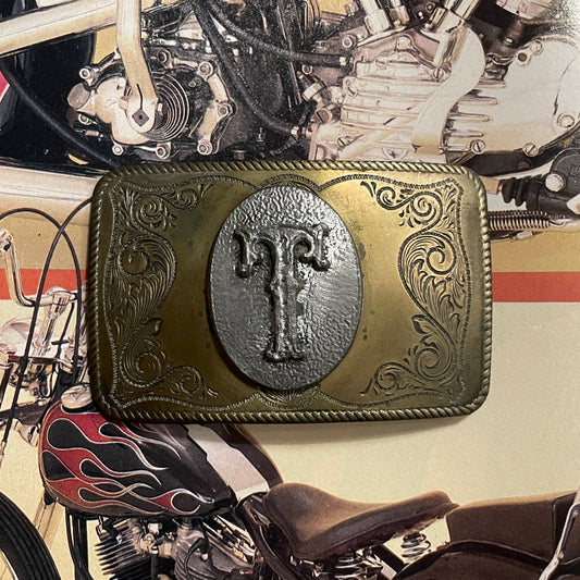 T Initial Buckle